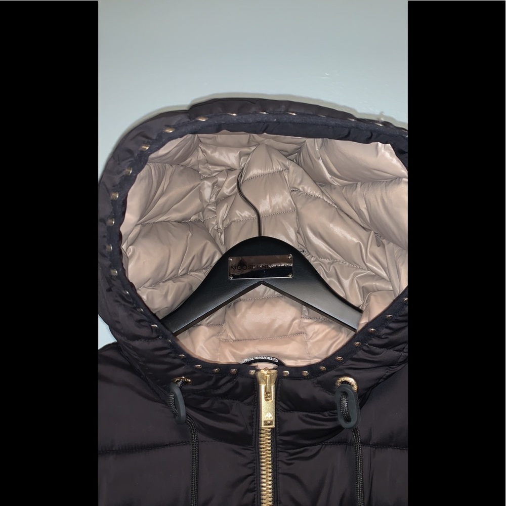 Women’s large moose knuckles marquee hooded black coat.